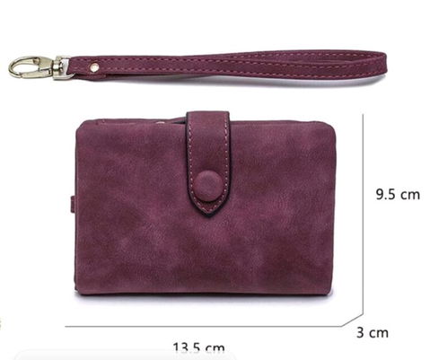Cartera muñequera con monedero