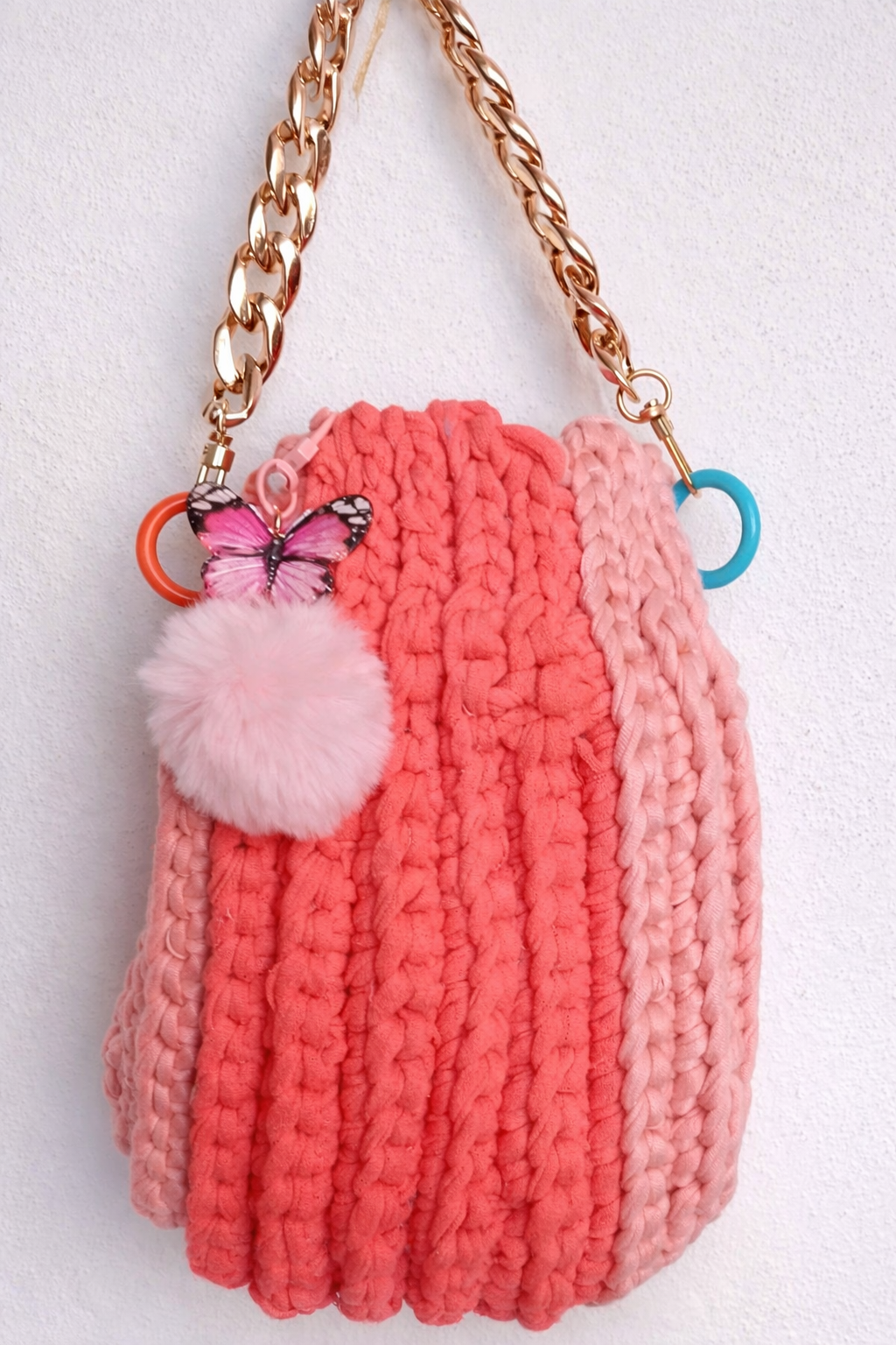 Bolsa muñequera tonos rosa
