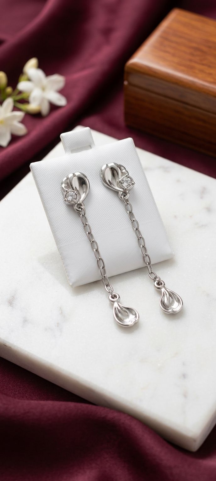 Aretes largos en forma de hoja de plata con 4 baños de platino