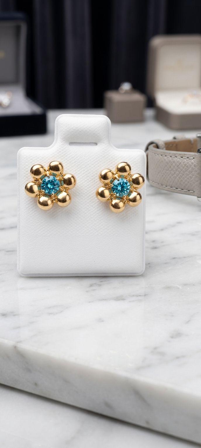 Aretes para niña en forma de  florales con cristal azul y baño de oro 18k - Nuevos