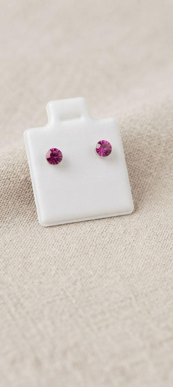 Aretes de platino con cristales rosa marca Nice