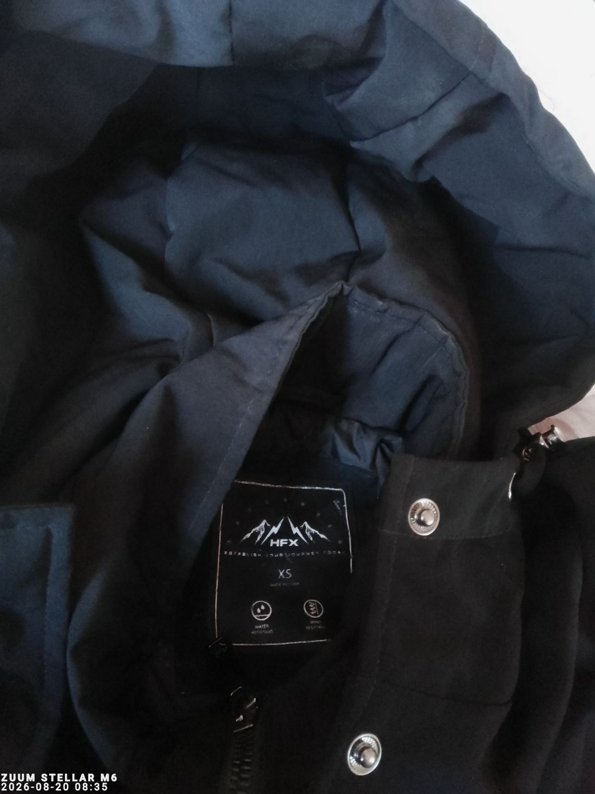 Chamarra negra elegante resistente al frío - Talla XS