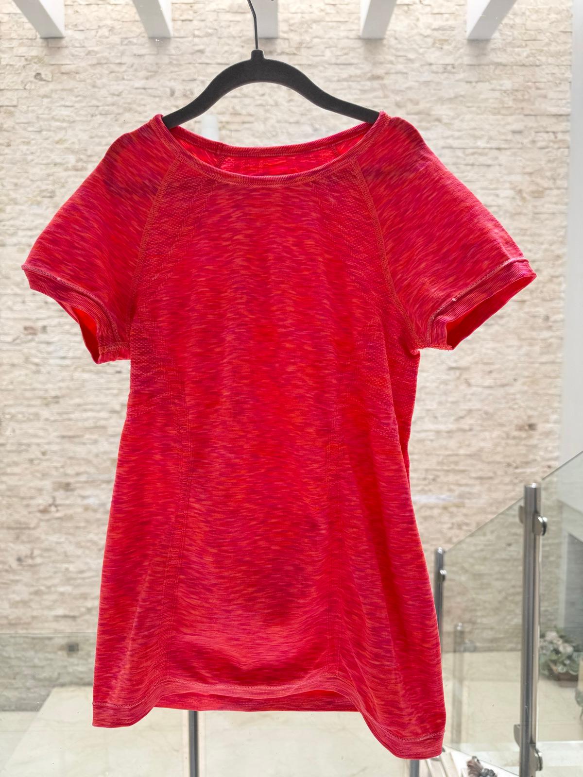 Camisa deportiva salmón fosforescente talla S