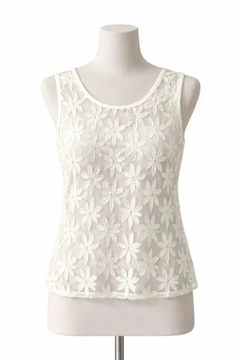 Blusa sin mangas blanca con bordado de flores