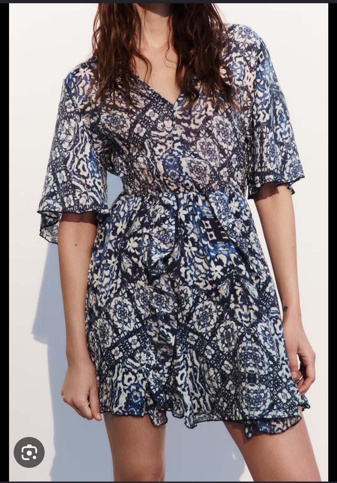 Vestido estampado con olanes ZARA