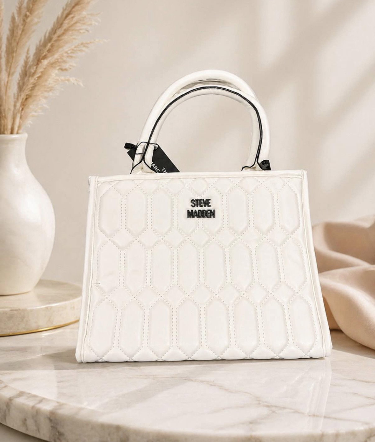 Bolsa elegante blanca con diseño de Steve Madden
