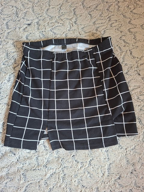 Mini falda negra con diseño de cuadros - SHEIN - Talla L