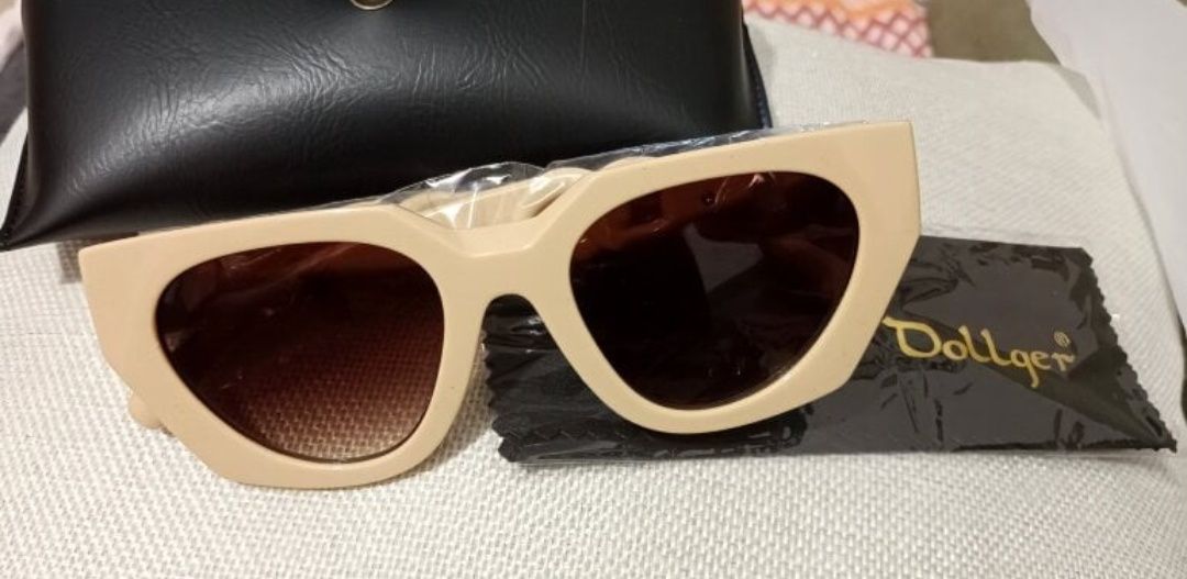 Lentes de sol Dollger con estuche NUEVOS 