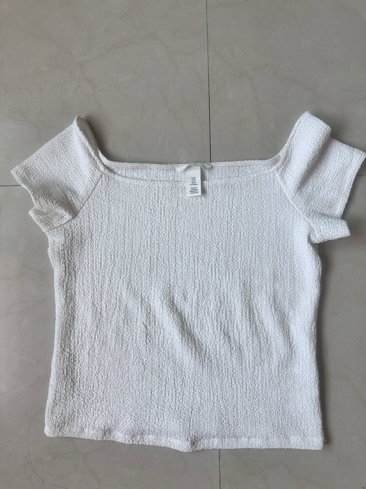Blusa color crema de H&M 