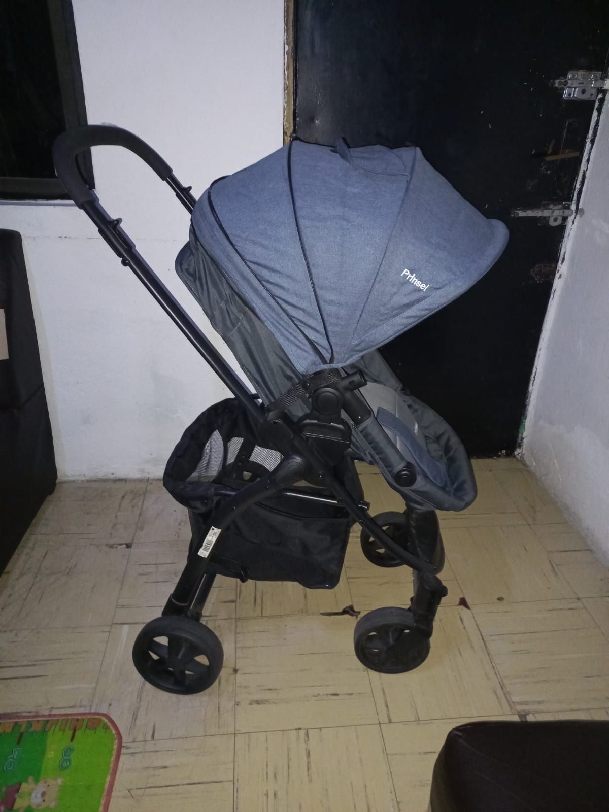 Carreola plegable con portabebé