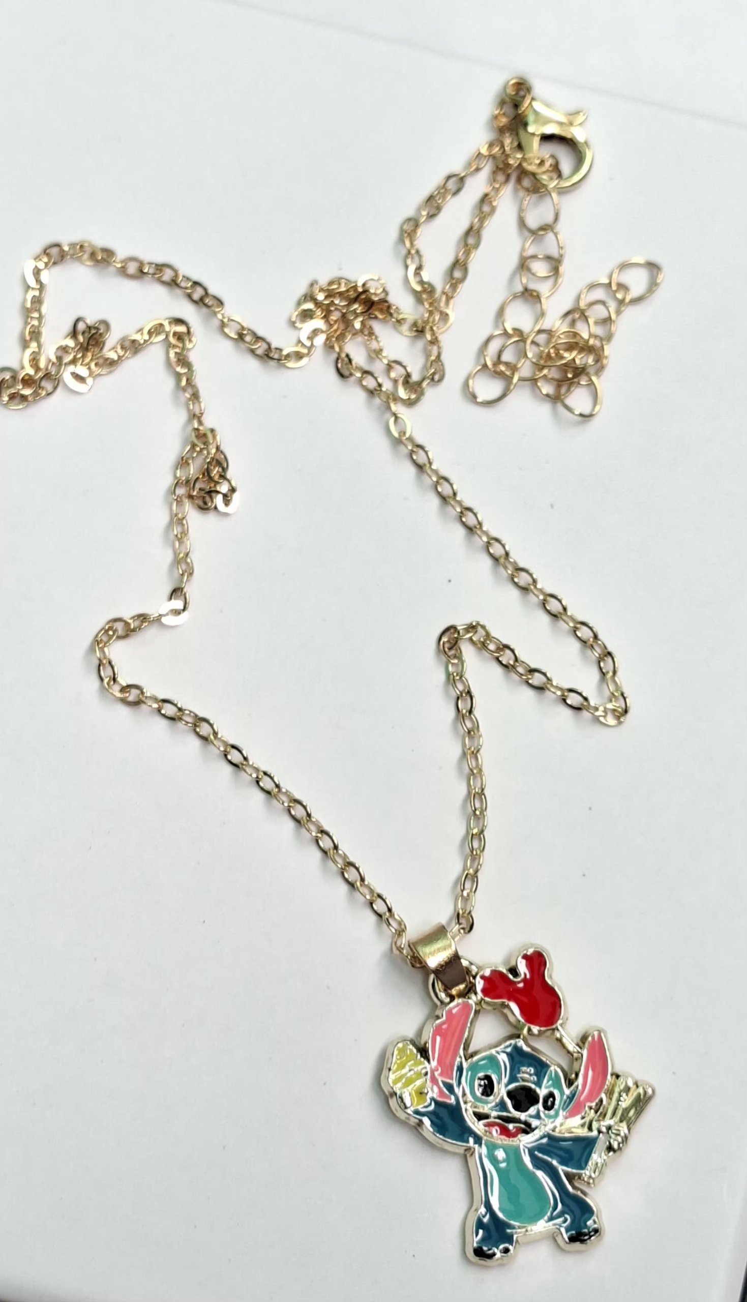 Collar de acero con dije de stich