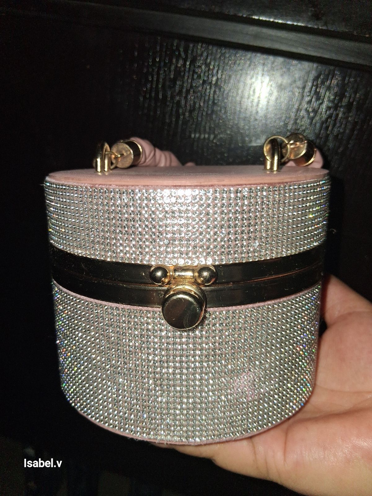 Bolso brillante de mano chico semi nuevo 
