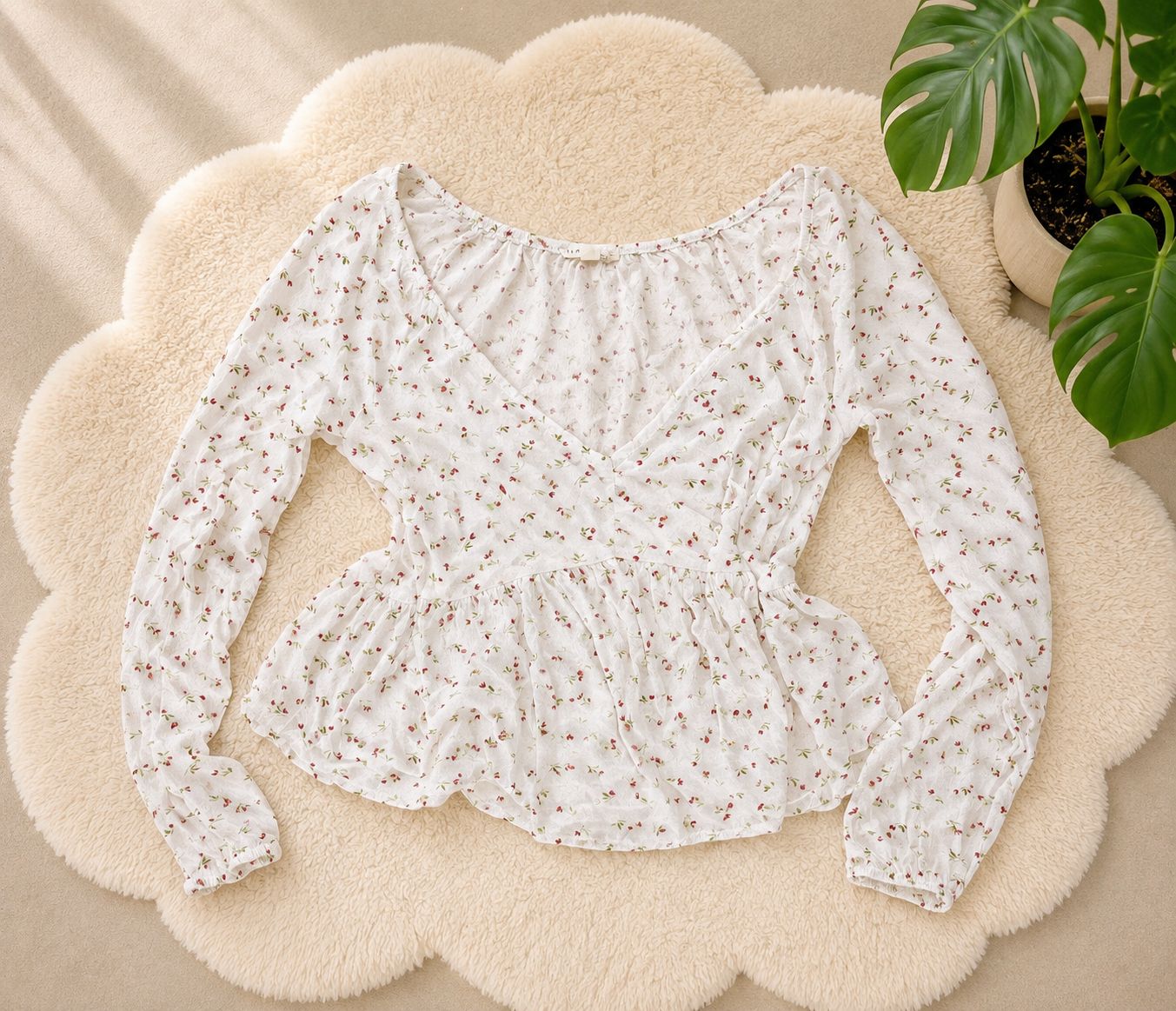Blusa blanca con estampado floral talla S