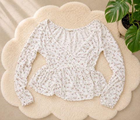 Blusa blanca con estampado floral talla S