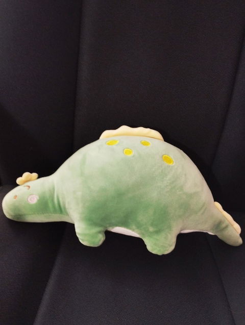 Dinosaurio de peluche