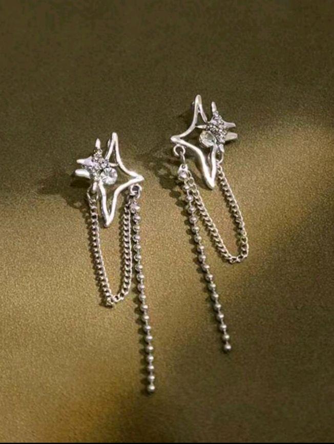 Un par de aretes estilo europeo-american