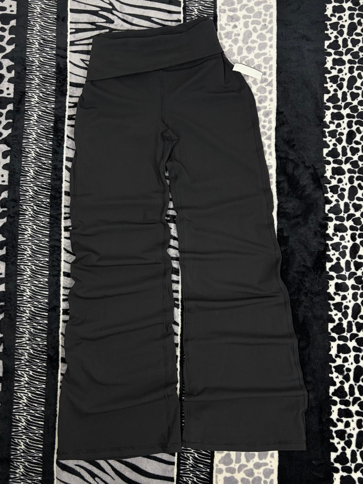 Pantalones deportivos negros de mujer