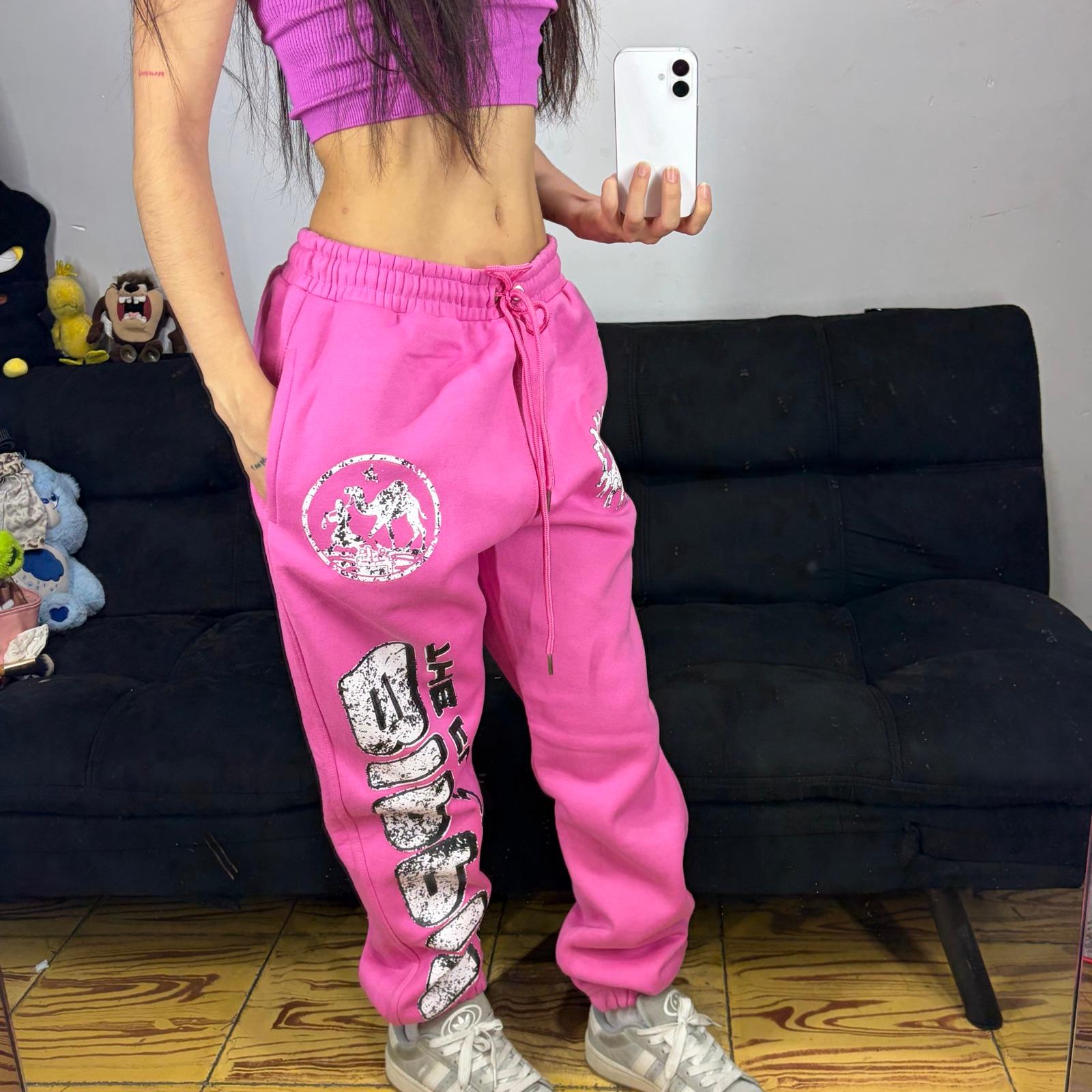 Pantalones deportivos rosa EIPPIN con estampado