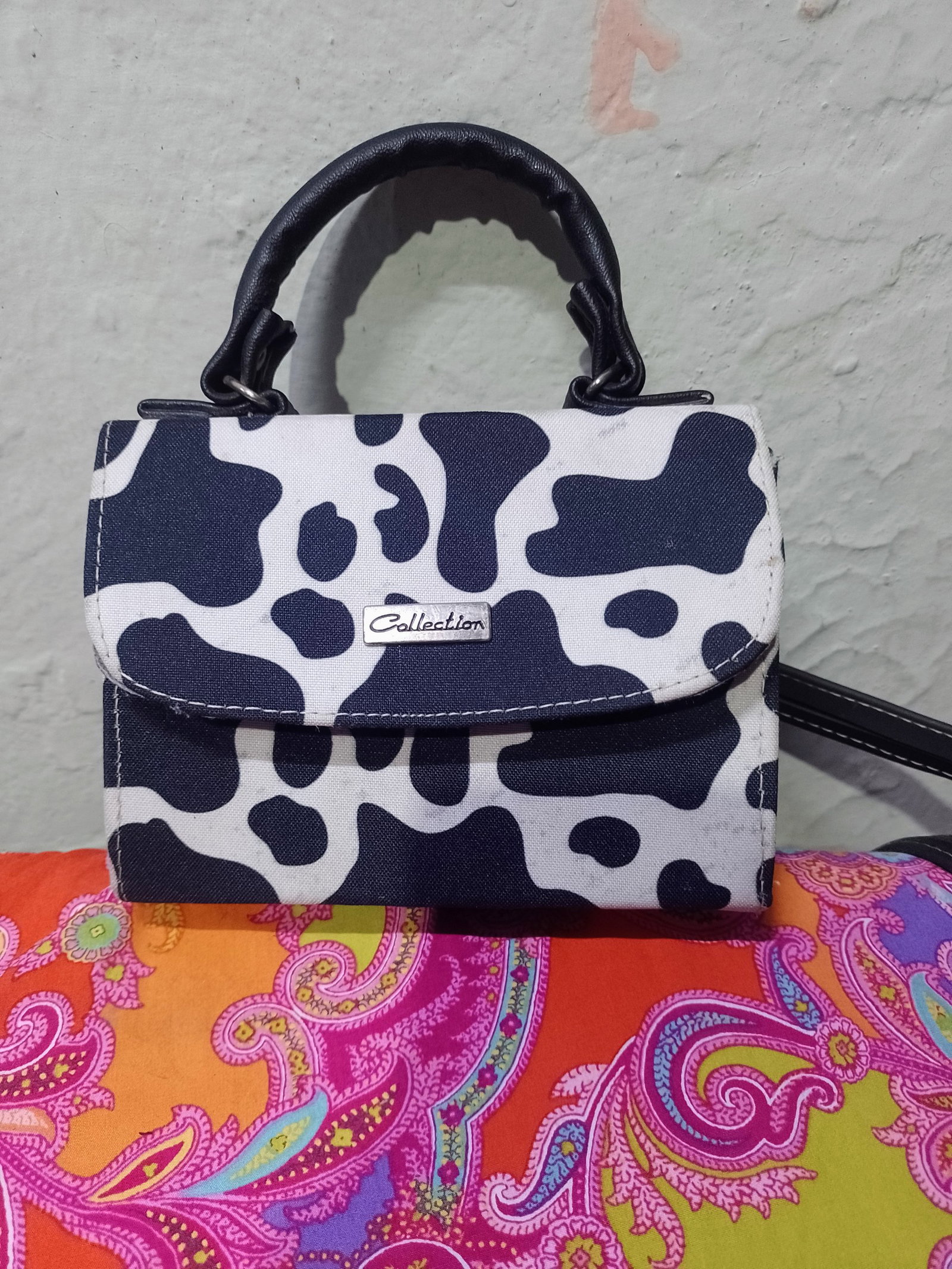 Bolsa chica de colección con diseño de vaca