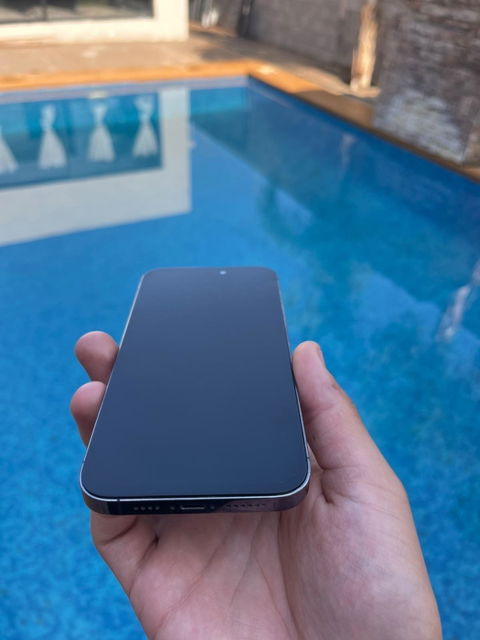 iPhone 14 Pro Max liberado, pantalla al 100, tapa quebrada