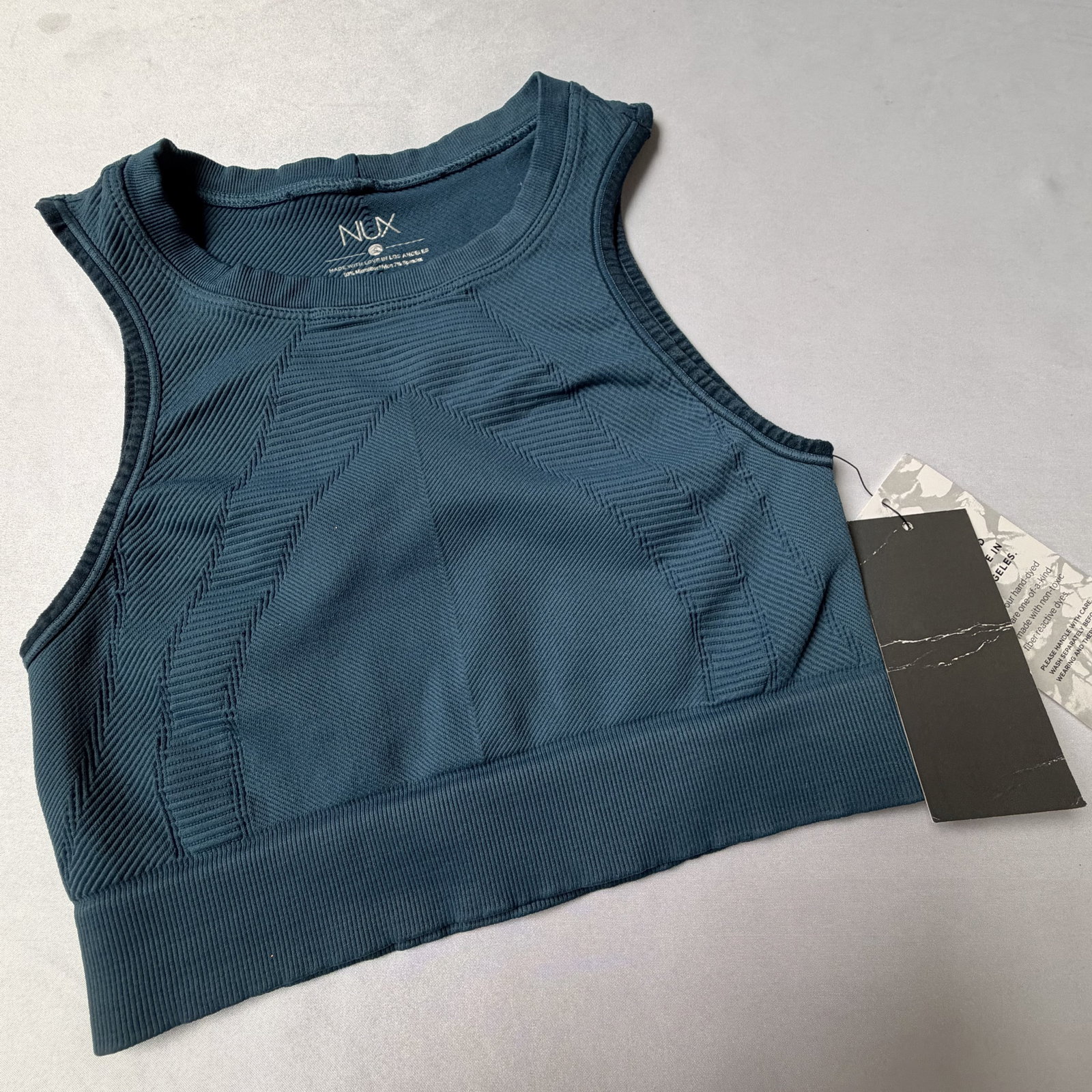 Top deportivo NUX TALLA S NUEVO