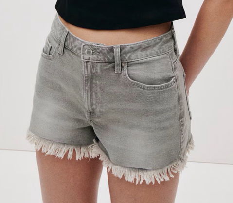 Shorts de denim de algodón con flecos